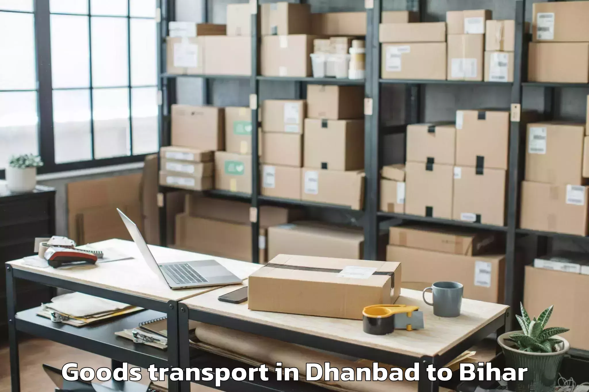 Affordable Dhanbad to Pipra Goods Transport